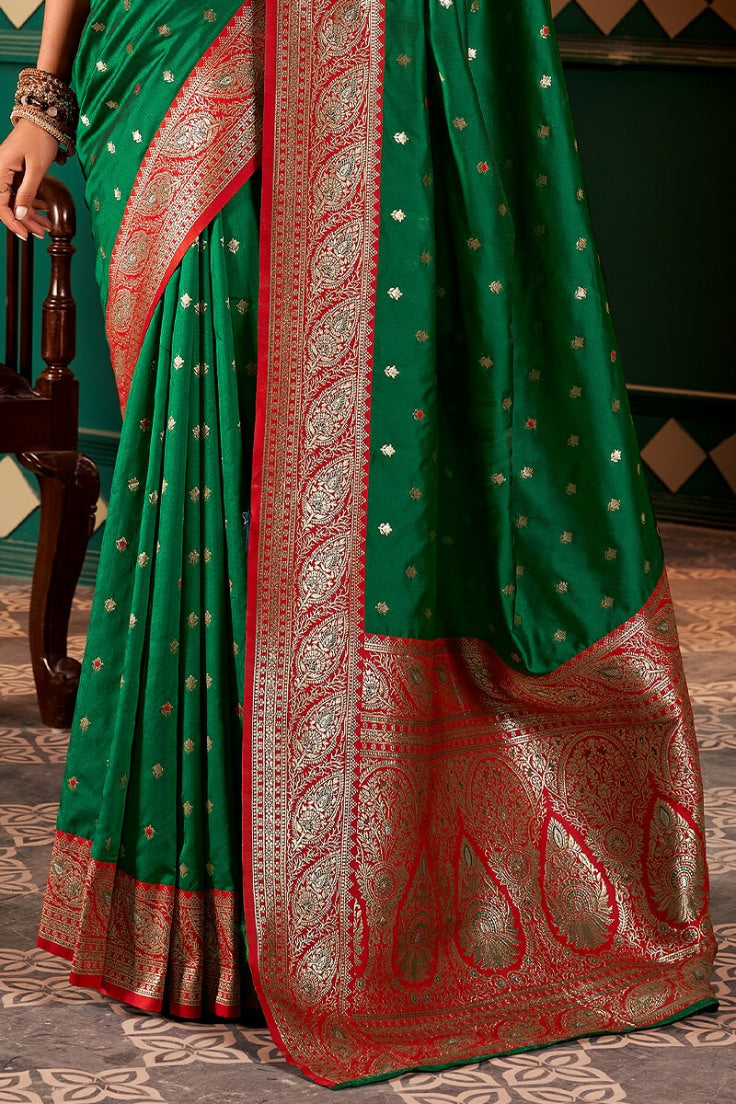 Alluring Dark Green Soft Banarasi Silk Saree With Zephyr Blouse Piece