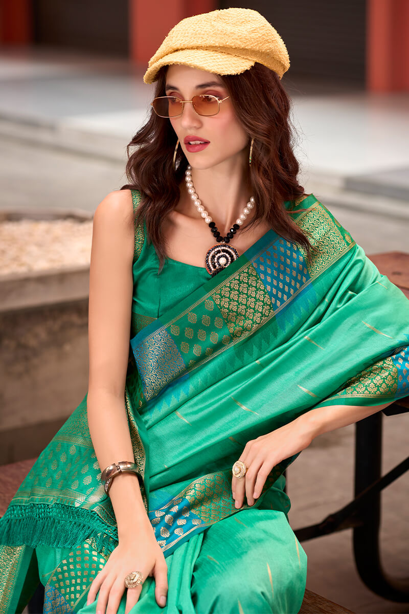 Capricious Sea Green Soft Banarasi Silk Saree With Charming Blouse Piece