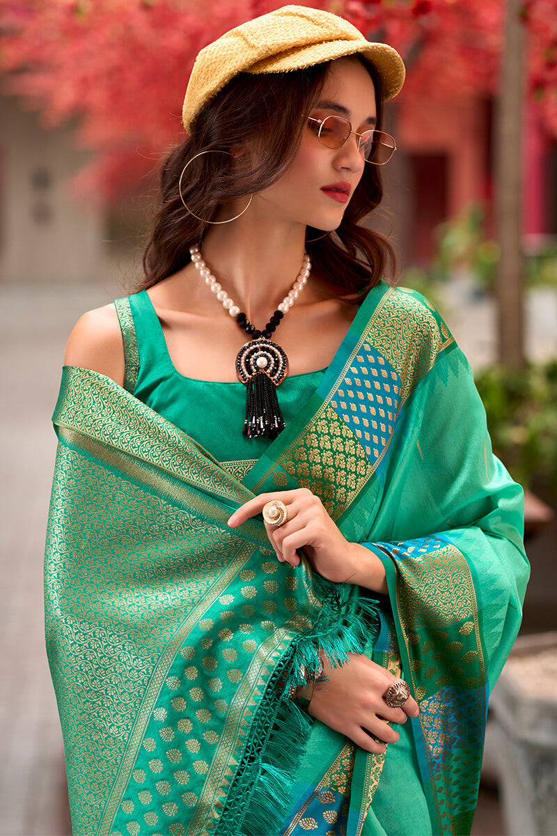 Capricious Sea Green Soft Banarasi Silk Saree With Charming Blouse Piece