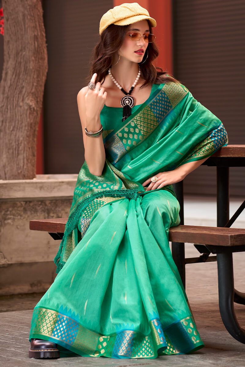 Capricious Sea Green Soft Banarasi Silk Saree With Charming Blouse Piece