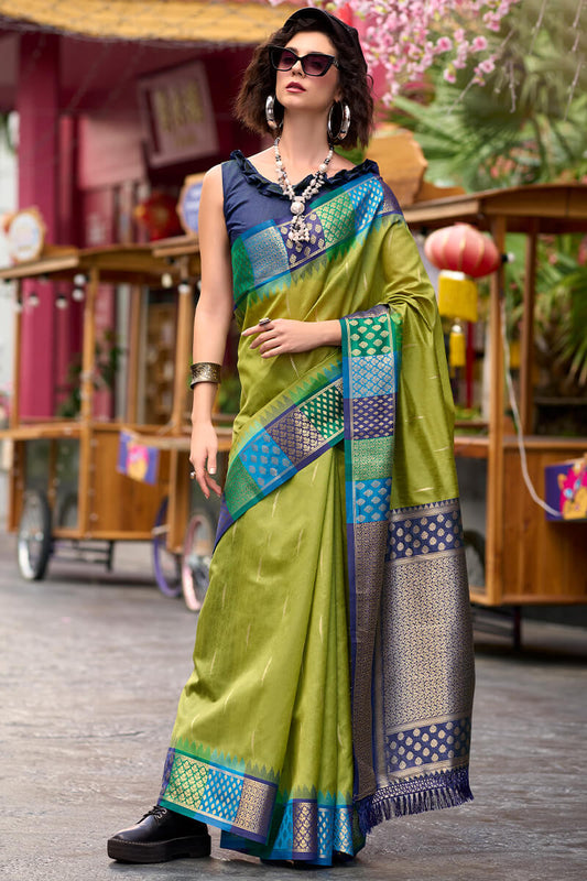 Exceptional Mehndi Soft Banarasi Silk Saree With Mesmeric Blouse Piece