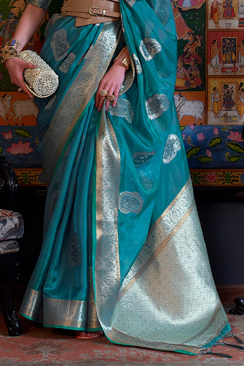 Ailurophile Turquoise Organza Silk Saree With Bewitching Blouse Piece