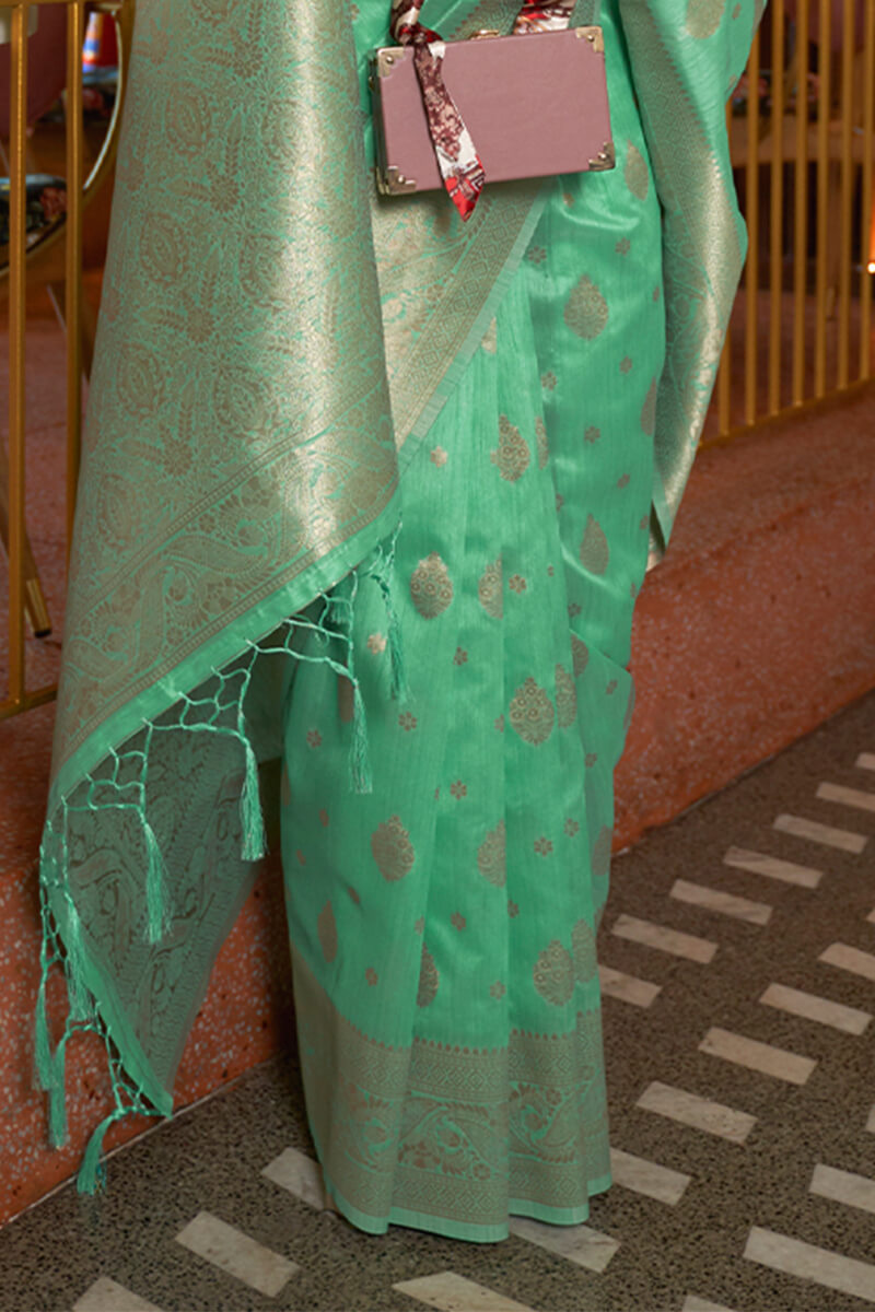 Confounding Sea Green Soft Banarasi Silk Saree With Redolent Blouse Piece