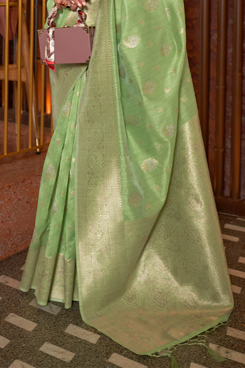 Desultory Pista Soft Banarasi Silk Saree With Beleaguer Blouse Piece