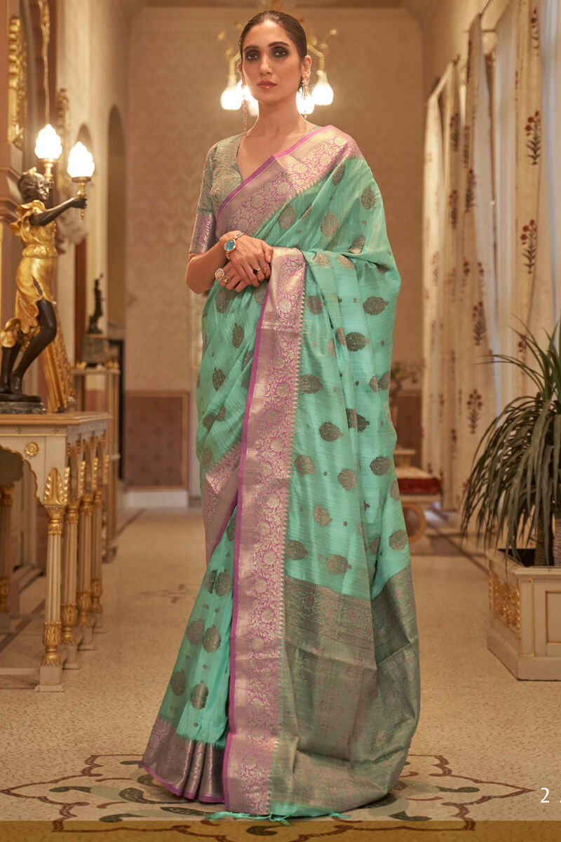 Lissome Sea Green Soft Banarasi Silk Saree With Ebullience Blouse Piece