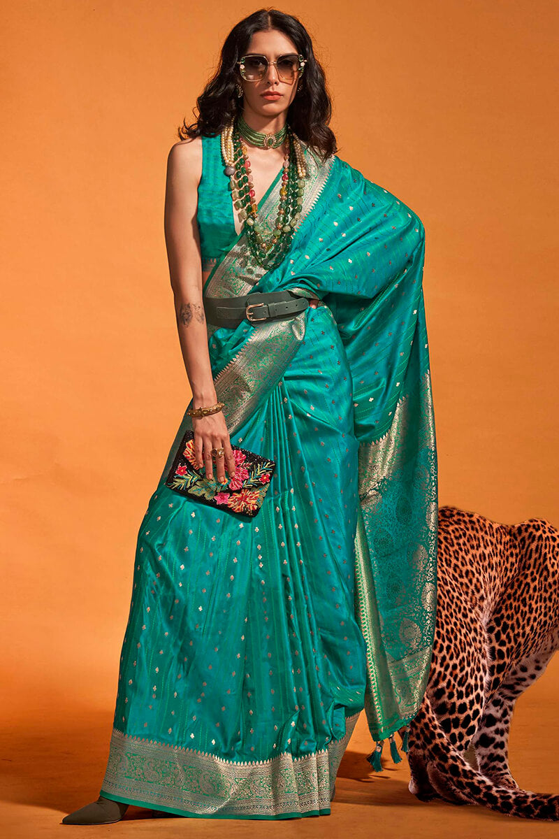 Fugacious Rama Soft Banarasi Silk Saree With Ineffable Blouse Piece