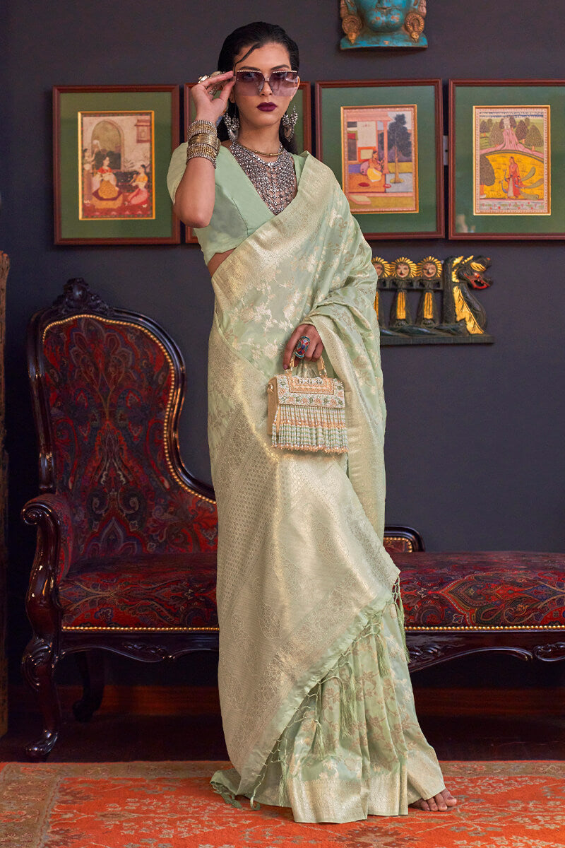 Divine Pista Soft Banarasi Silk Saree With Demure Blouse Piece