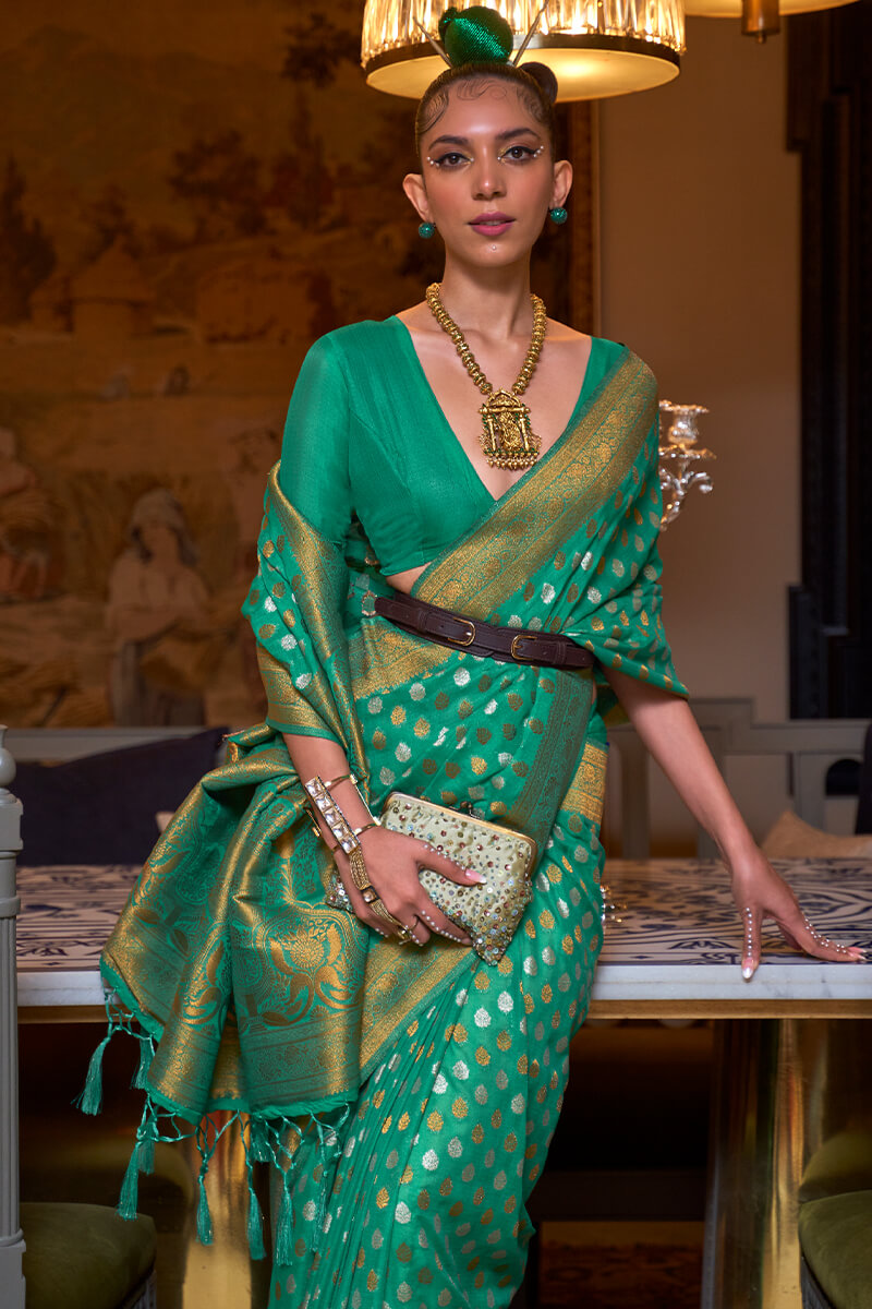 Intricate Green Soft Banarasi Silk Saree With Flaunt Blouse Piece