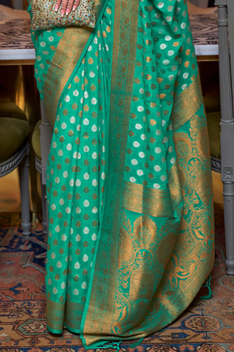 Intricate Green Soft Banarasi Silk Saree With Flaunt Blouse Piece