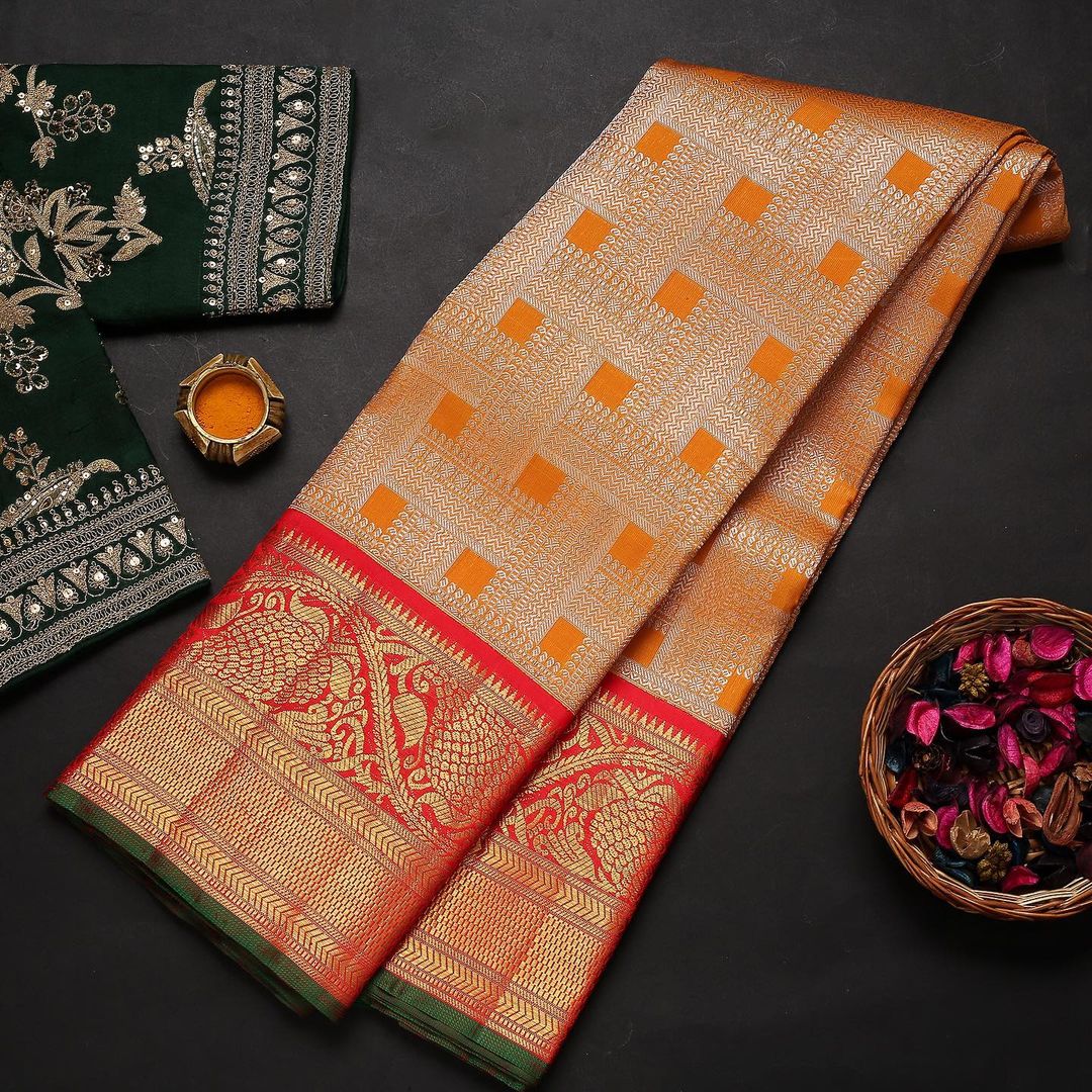 Gratifying Orange Soft Banarasi Silk Saree With Two Attractive Blouse Piece