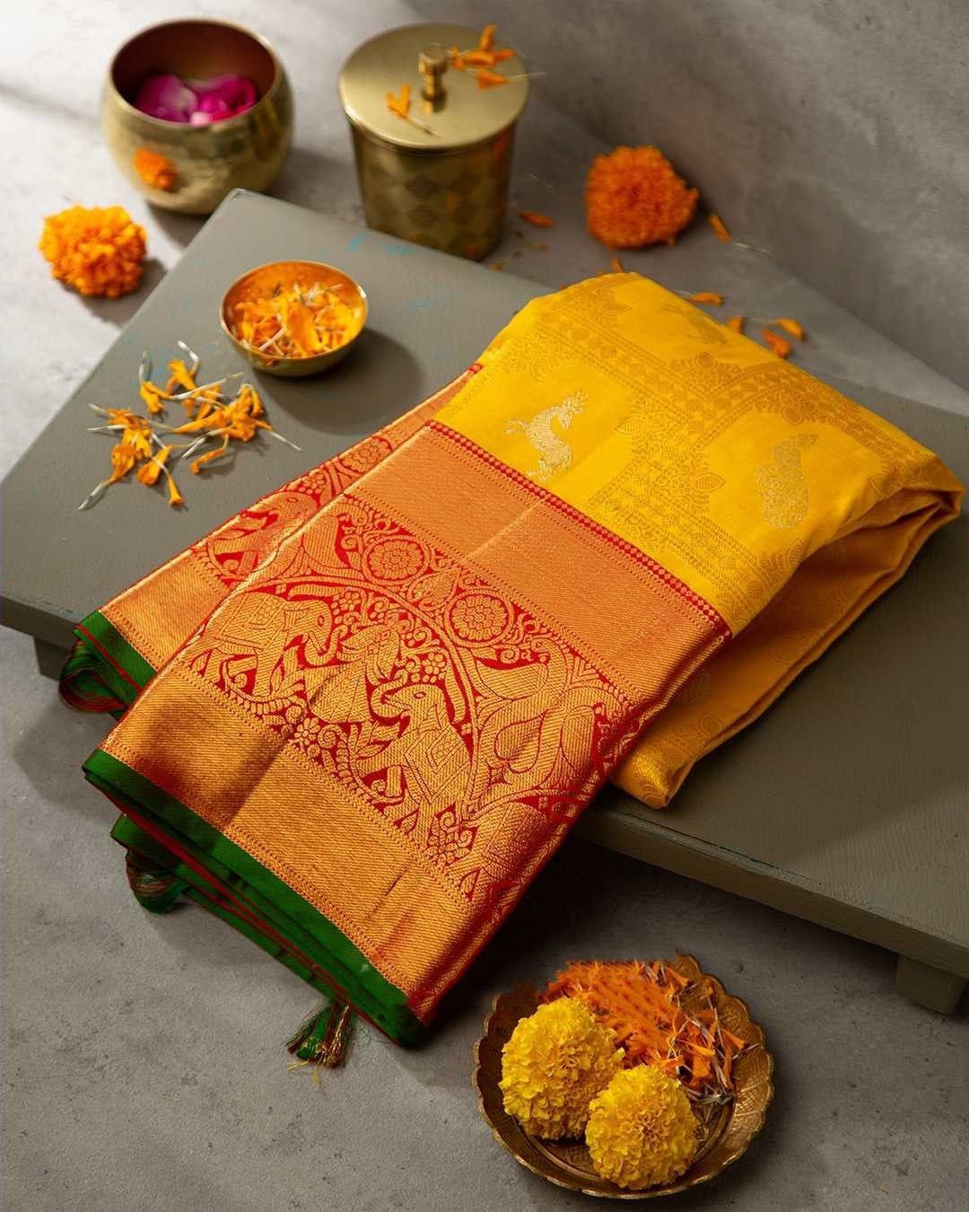 Gossamer Yellow Soft Banarasi Silk Saree With Cynosure Blouse Piece