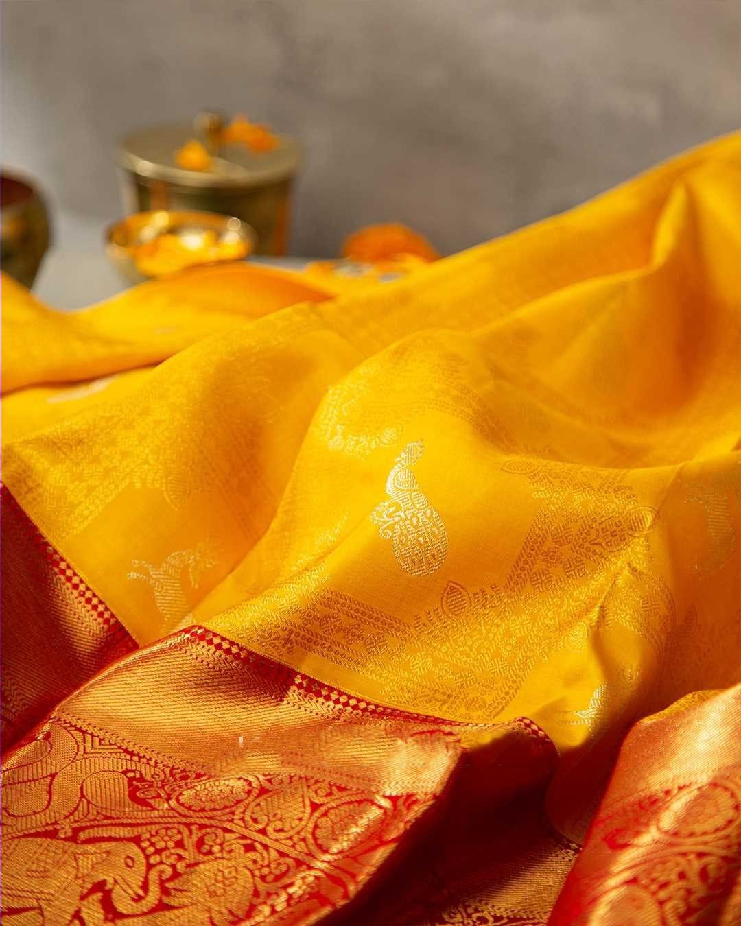 Gossamer Yellow Soft Banarasi Silk Saree With Cynosure Blouse Piece