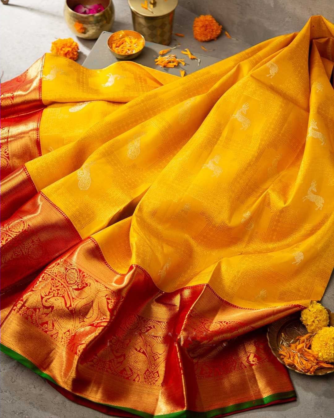 Gossamer Yellow Soft Banarasi Silk Saree With Cynosure Blouse Piece