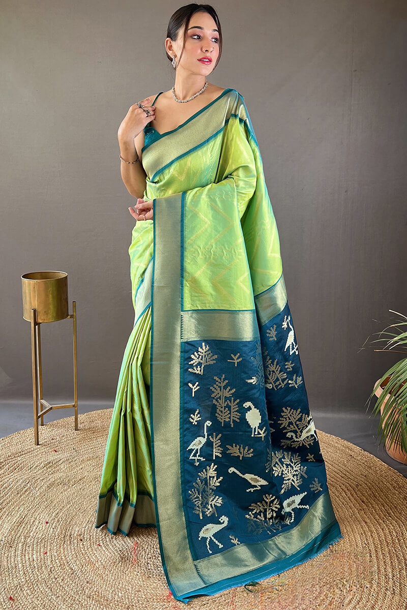 Majesty Parrot Soft Banarasi Silk Saree With Dulcet Blouse Piece