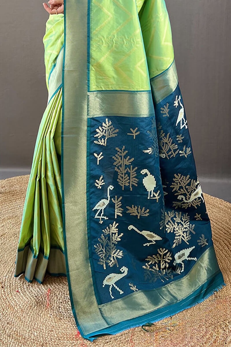 Majesty Parrot Soft Banarasi Silk Saree With Dulcet Blouse Piece