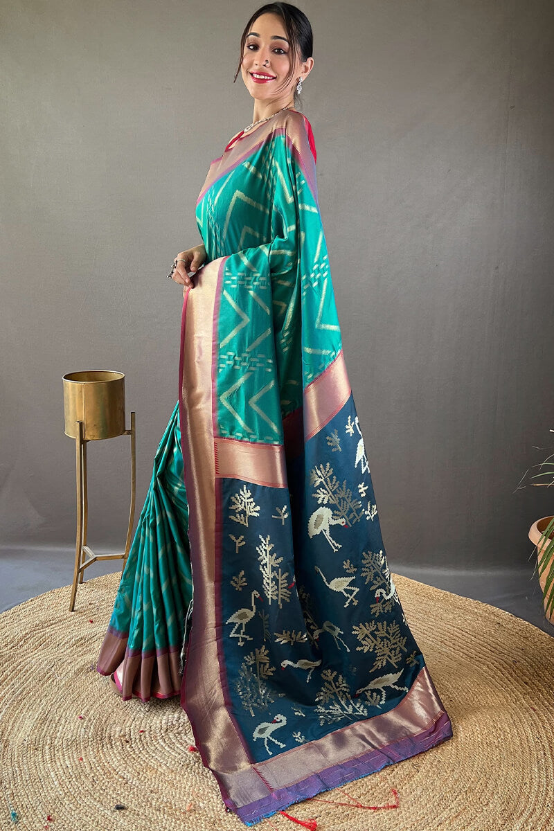 Cynosure Rama Soft Banarasi Silk Saree With Panache Blouse Piece