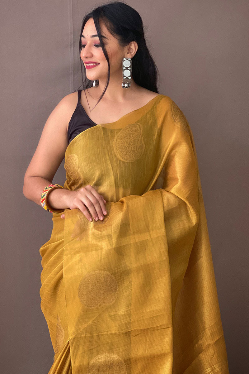 Jazzy Mustard Soft Banarasi Tissue Silk Saree With Majesty Blouse Piece