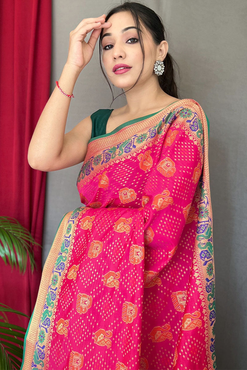 Lassitude Dark Pink Patola Silk Saree with Staggering Blouse Piece