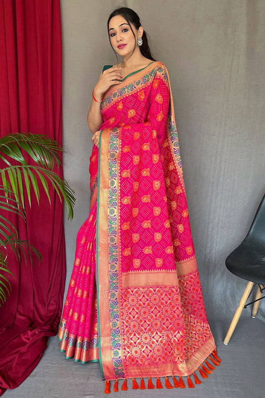 Lassitude Dark Pink Patola Silk Saree with Staggering Blouse Piece