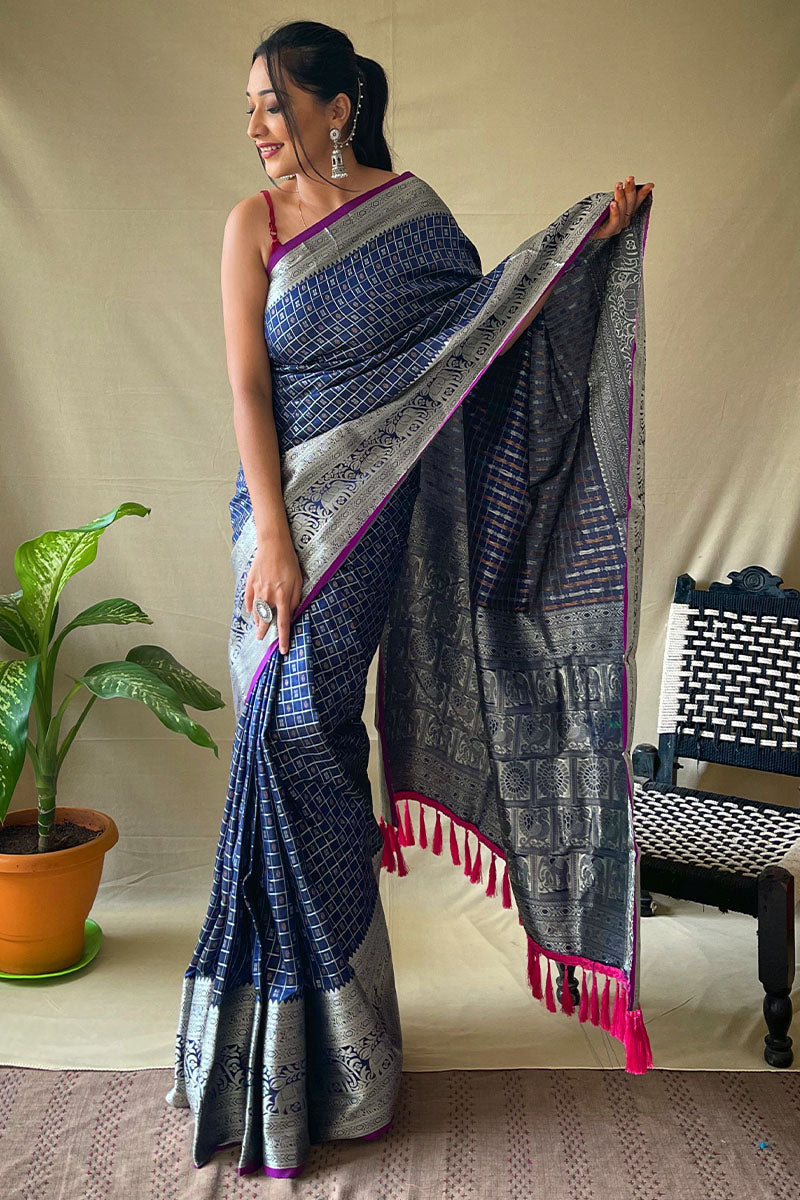 Engaging Navy Blue Soft Banarasi Silk Saree With Enchanting Blouse Piece