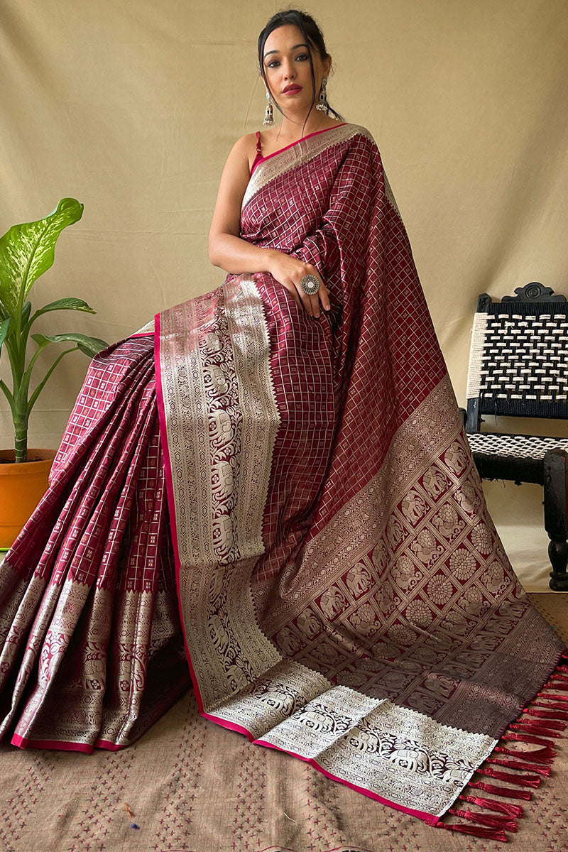 Effervescent Wine Soft Banarasi Silk Saree With Cynosure Blouse Piece