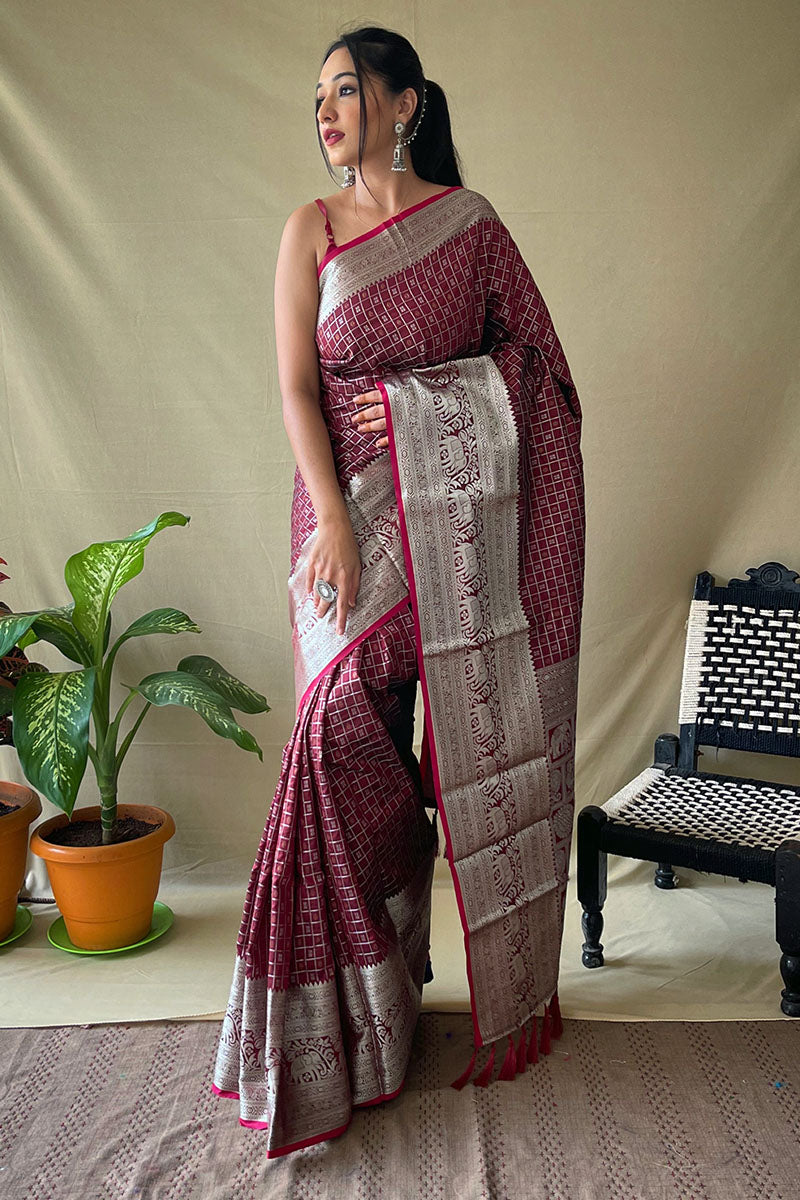 Effervescent Wine Soft Banarasi Silk Saree With Cynosure Blouse Piece