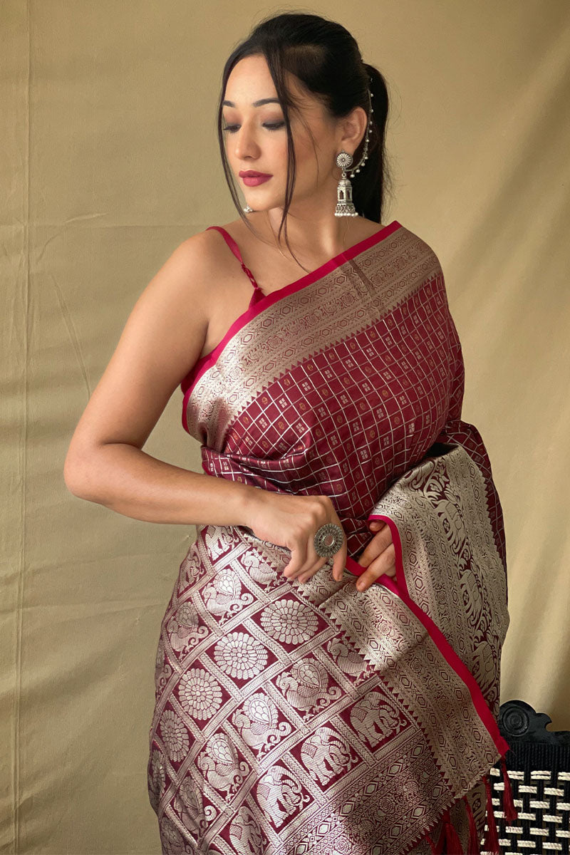 Effervescent Wine Soft Banarasi Silk Saree With Cynosure Blouse Piece