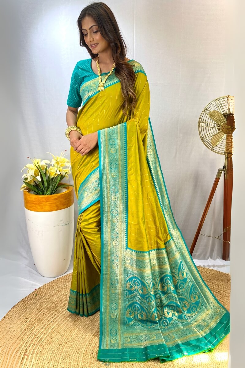 Entrancing Mehndi Soft Banarasi Silk Saree With Exquisite Blouse Piece