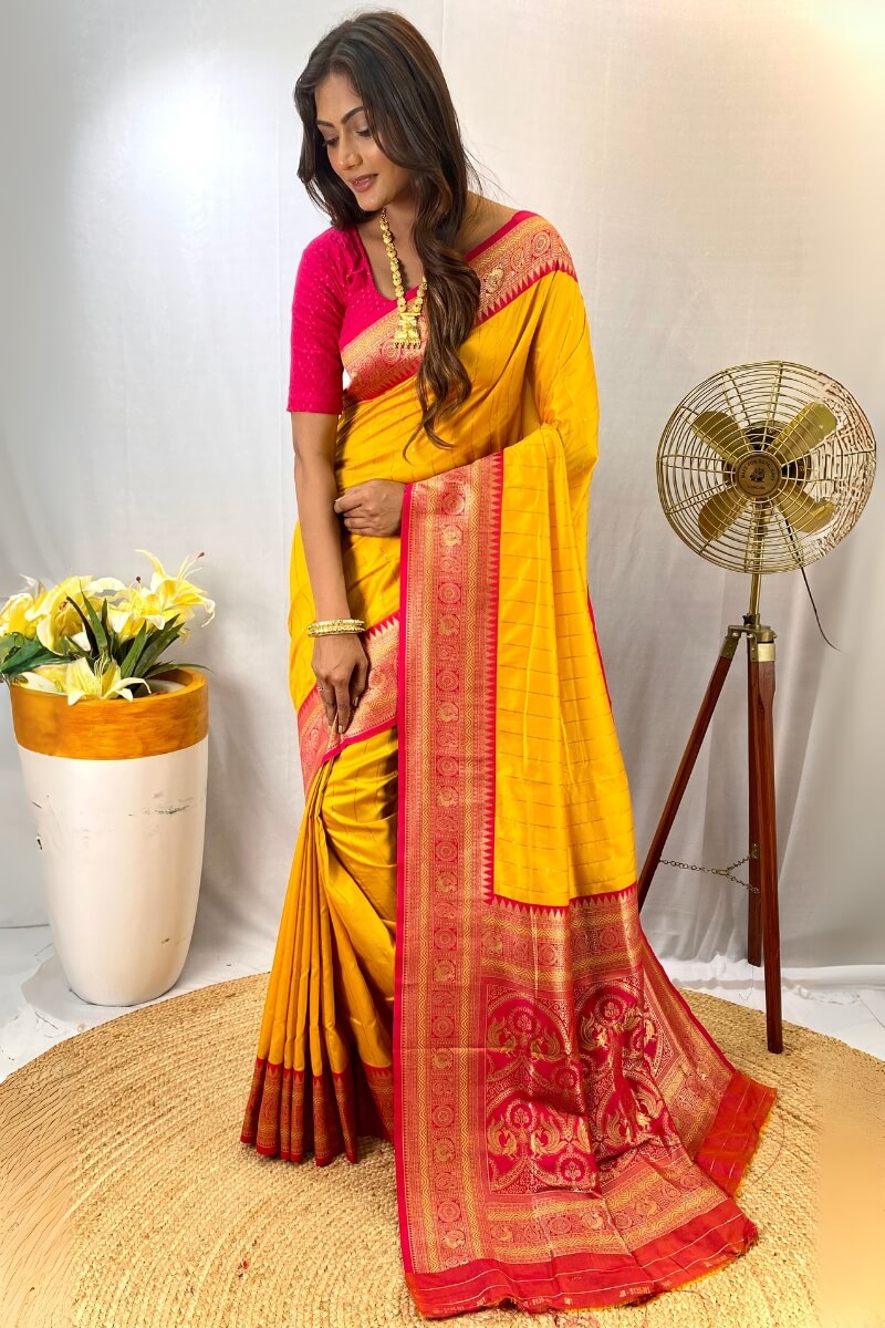 Enthralling Yellow Soft Banarasi Silk Saree With Aplomb Blouse Piece