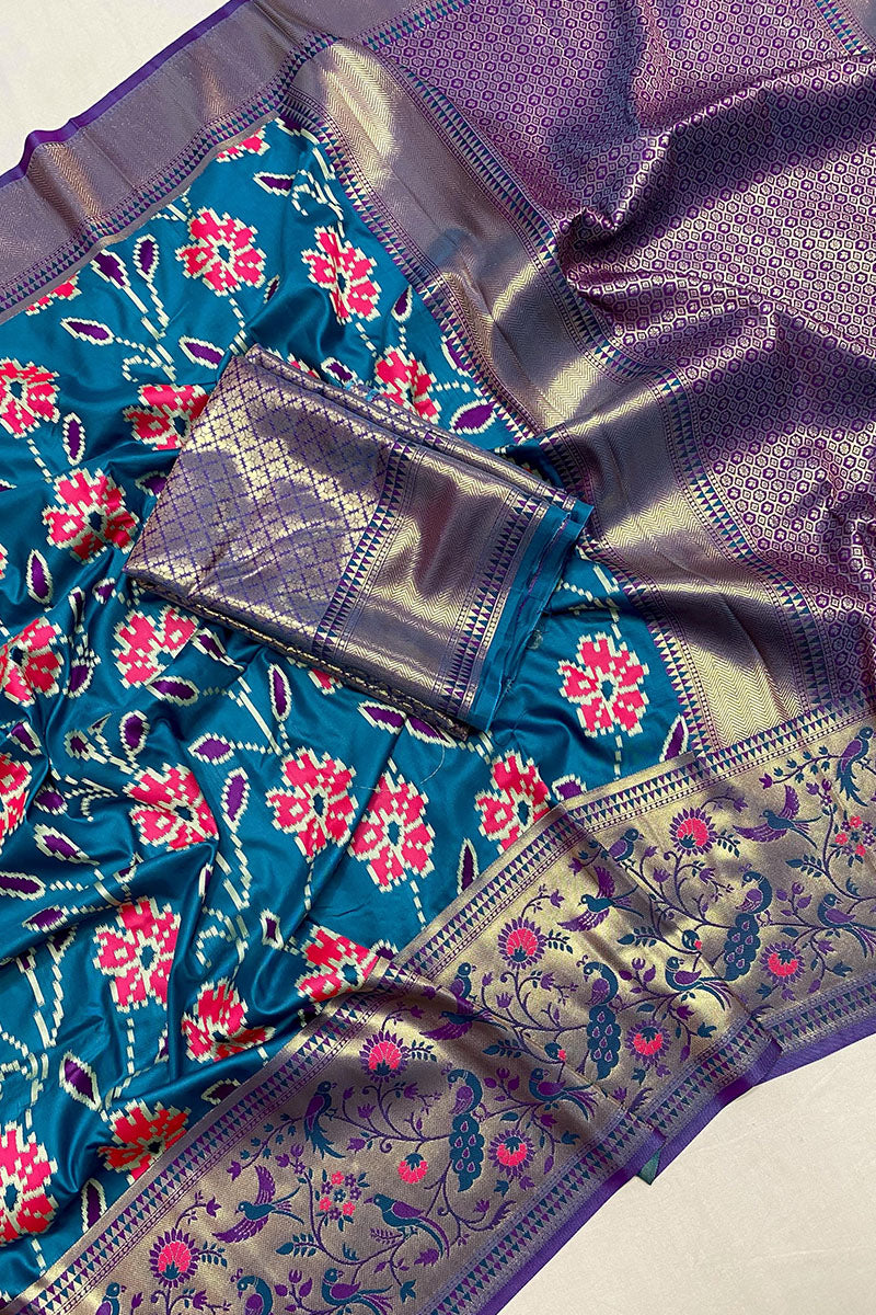 Energetic Firozi Patola Silk Saree with Lovely Blouse Piece