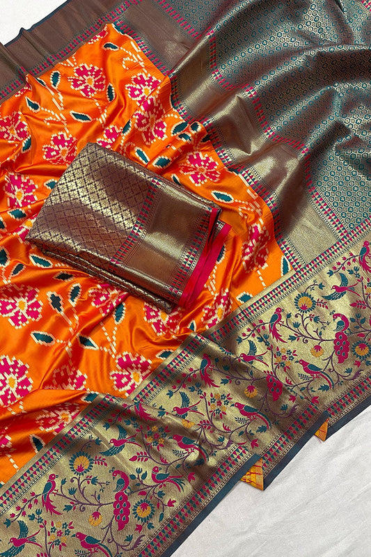 Mesmeric Orange Patola Silk Saree with Mesmeric Blouse Piece