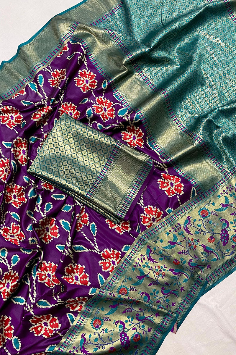 Cynosure Purple Patola Silk Saree with Desuetude Blouse Piece