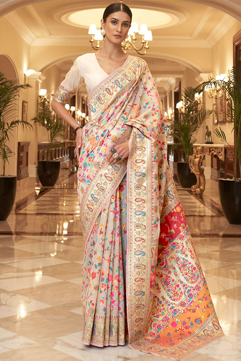 Gratifying Beige Pashmina saree With Panoply Blouse Piece