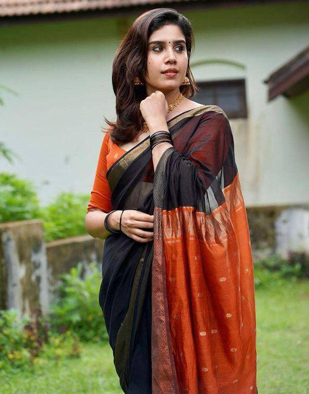 Black & Orange Soft Linen Silk Saree With Zari Weaving Work